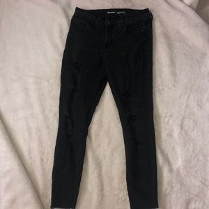 distress black jeans with holes